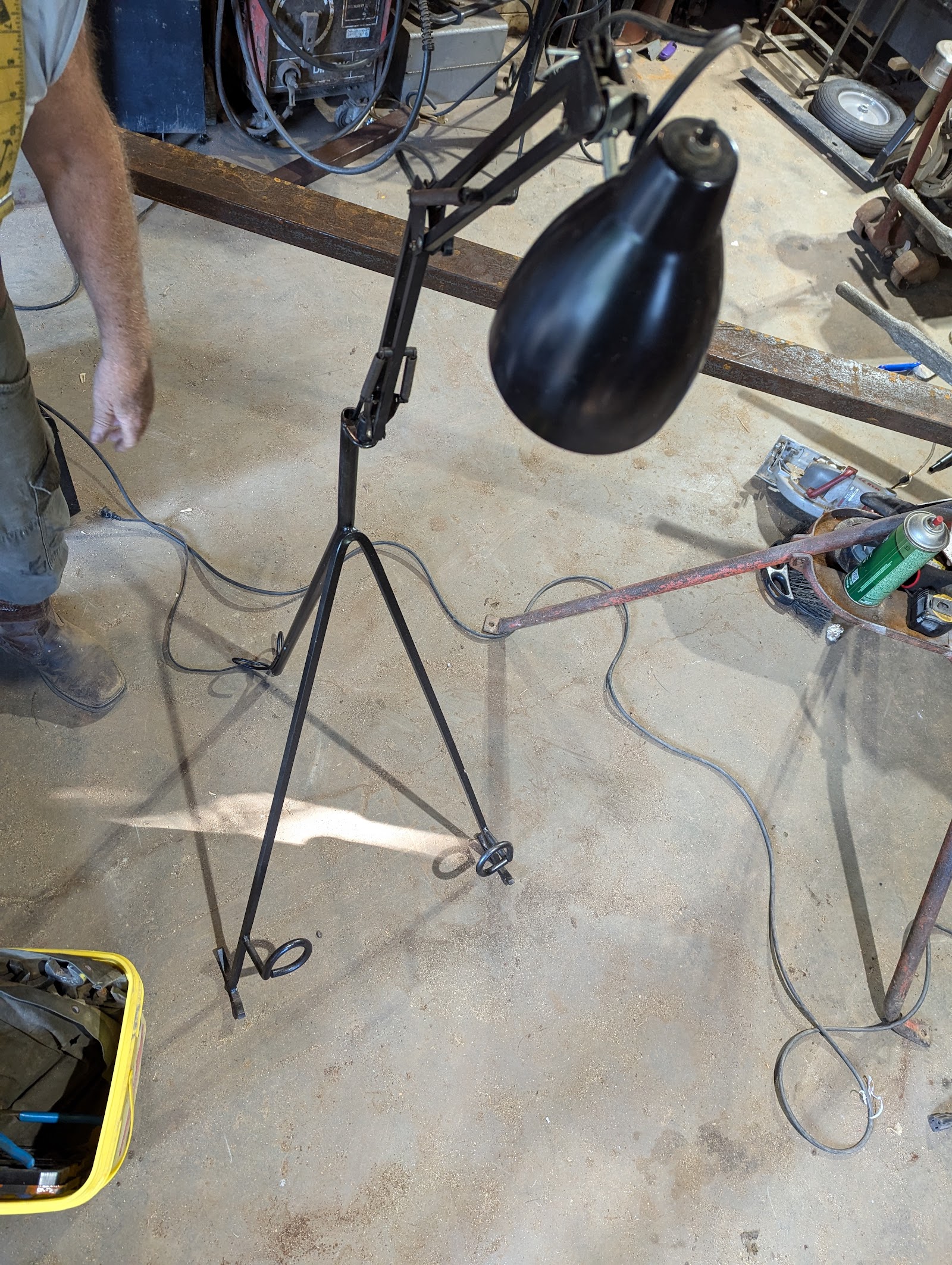 Hand-forged metal lamp in the workshop